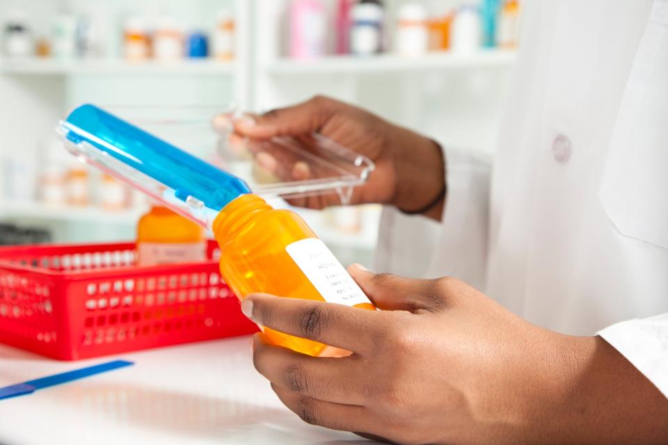 A pharmacist preparing a prescription.