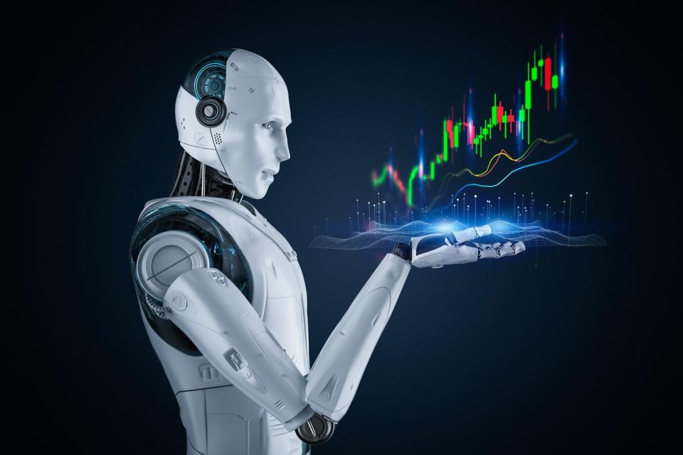 A robot looking at a stock chart going up.