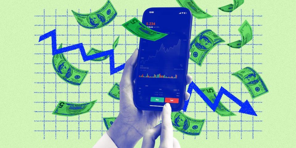 A hand holding a phone with a stock market app displayed. In the background, cash is falling, and a trending line on a grid depicts a decline