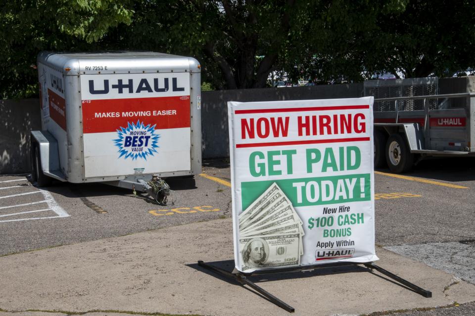 New Brighton, Minnesota. U-Haul hiring sign offering to get paid today and a bonus. (Photo by: Michael Siluk/UCG/Universal Images Group via Getty Images)