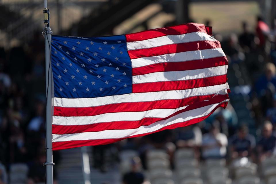 Jun 8, 2024; Sonoma, California, USA;  General view of the United States flag flying in the wind before the start of the NASCAR Xfinity Sonoma 250 at Sonoma Raceway. Mandatory Credit: Stan Szeto-USA TODAY Sports